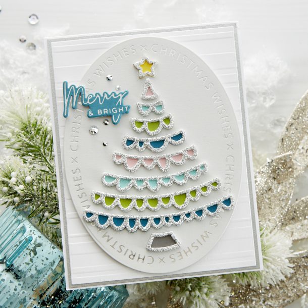 GLP-182 Christmas Essential Glimmer Ovals: Send lots of kisses with the “X’s” and sentiments that make up this 3 Glimmer plate set. Create a foiled card base or die cut ovals using the Essential Oval die set (S4-1038) to create stunning Christmas cards. What’s New | Spellbinders Sparkling Christmas Collection #Spellbinders #NeverStopMaking #DieCutting #Cardmaking #GlimmerHotFoilSystem #Christmas